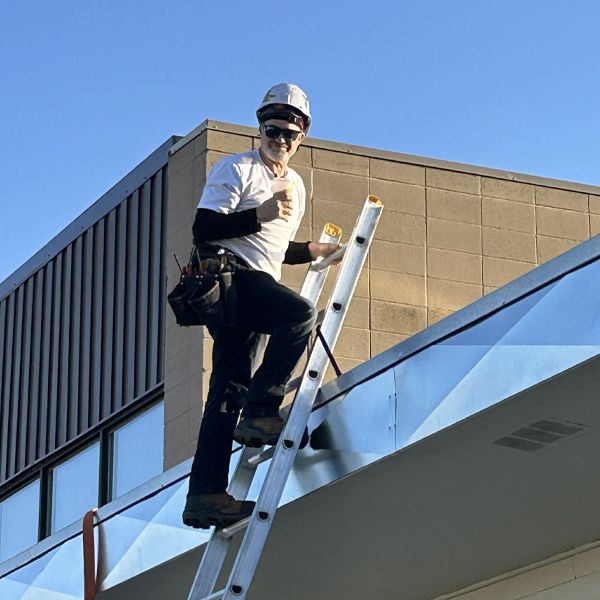 HVAC Doctor on a commercial rooftop